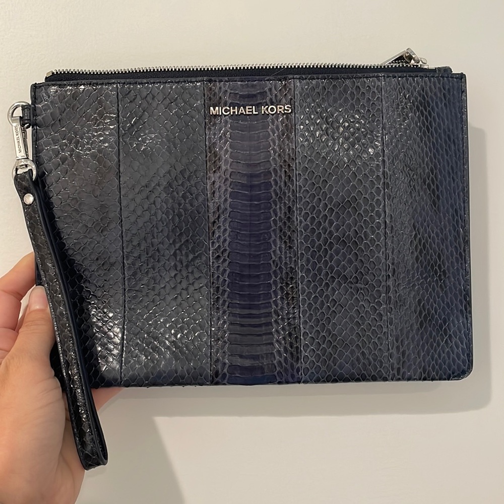 Michael Kors navy snake skin original w/silver tone accents.